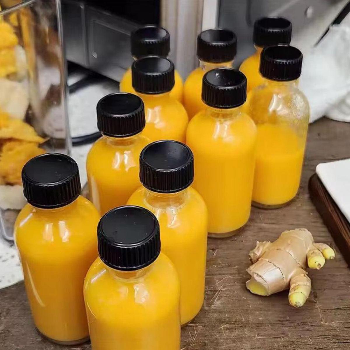 16 Piece Glass Ginger Shot Bottle Set